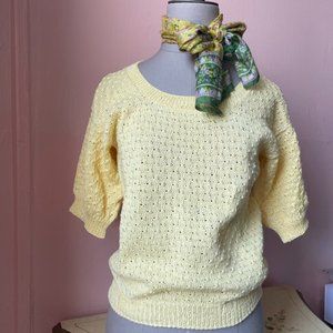 Handmade knitted pastel yellow cotton sweater